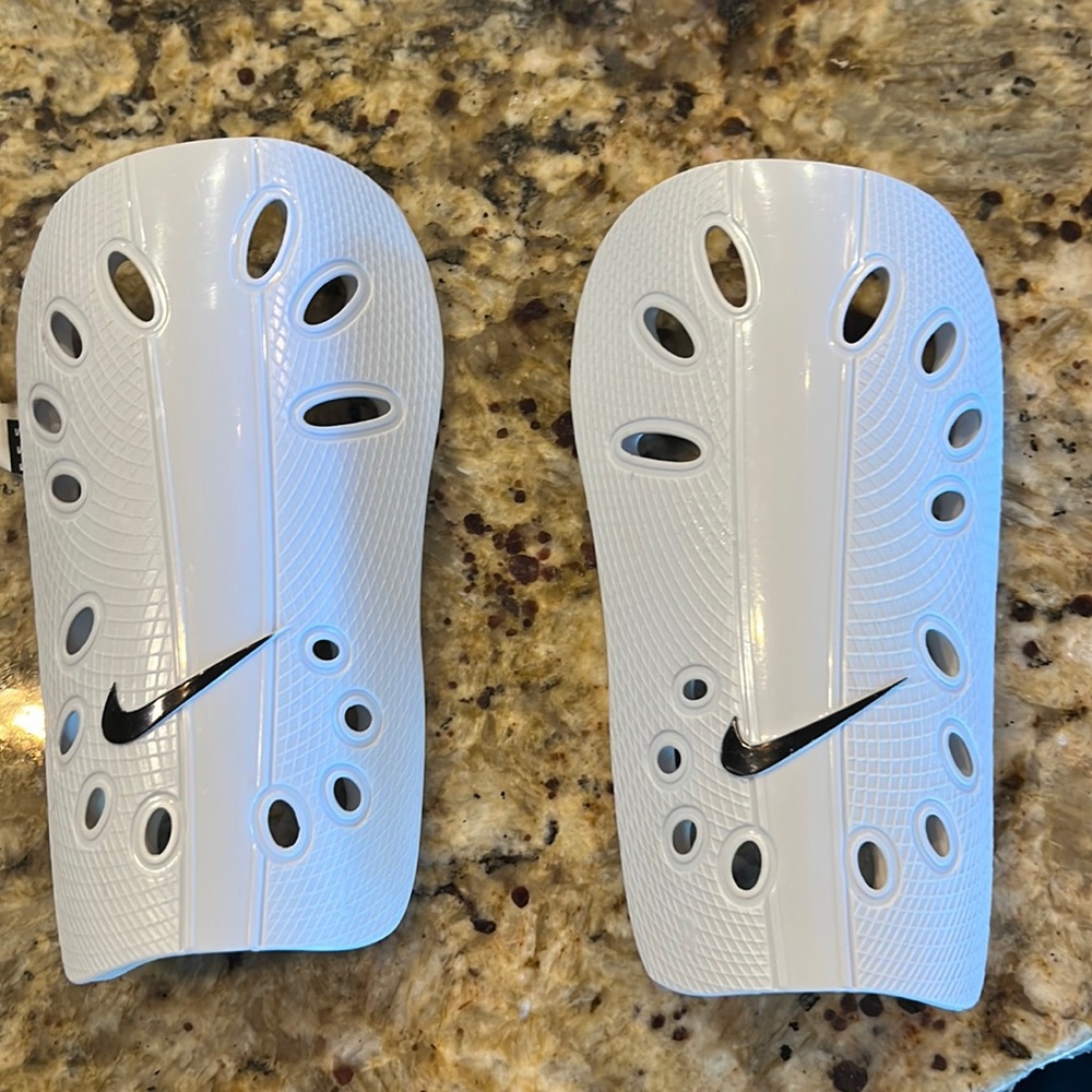 Nike Soccer shin guards with black shin sleeves